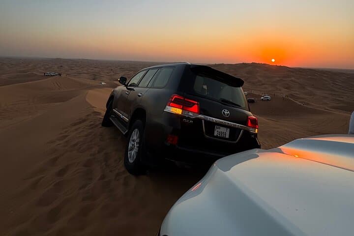 Sunset red dune safari, camel ride and BBQ dinner in Ajman — Adventure things to do in Ajman
